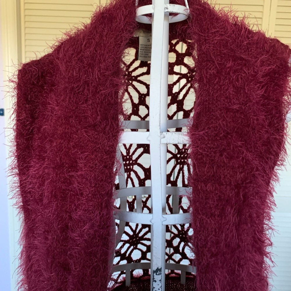 From NYC This beautiful vest will go with anything, and very rich color